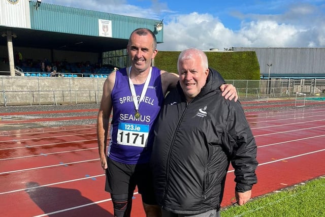 Seamus McAteer and the president of Athletics Ireland John Cronin.