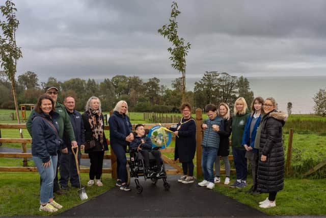 In attendance during the official opening of the new sensory area at Carnfunnock Country Park were MEA Mayor, Ald Geraldine Mulvenna; Cllr Maeve Donnelly, representatives of the Mae Murray Foundation, and MEA officers Tara McAleese (Principal Parks Officer); Lindsay Houston (Parks Dev Manager); Kerry Fokkens (Principal Parks Duty Officer); Chris Wood (Woodland Engagement Officer), and Stephen Dines (Playground Inspector).  Photo: Chris Neely