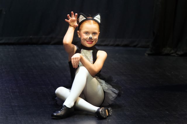 Sophie Evans performs in the Novice Tap Solo 7-8 years competition at Portadown Dance Festival. PT18-200.