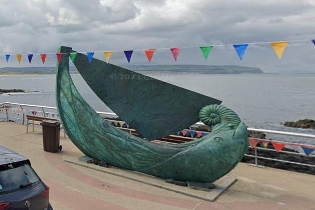 'Fishing Boat' was erected in 1996 by Wicklow based artist Niall O’ Neill, and has pride of place on the promenade at Portstewart. It was built to commemorate the life of local songwriter Jimmy Kennedy and combines Celtic and Viking decorative touches. On further inspection the boat reveals itself to be a giant swooping fish with a shell in its mouth, adding an element of the surreal to the seafront.Songwriter Jimmy Kennedy wrote his world famous 'Red Sails in the Sunset' after being inspired by a boat he saw from the Prom in Portstewart.