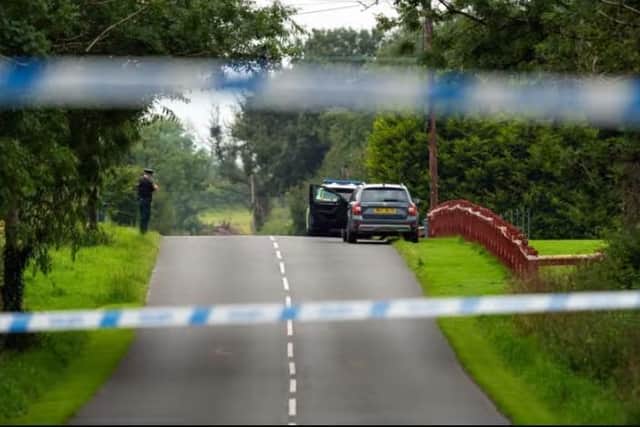Police at the scene following the shooting incident at Maguiresbridge. Picture: Pacemaker
