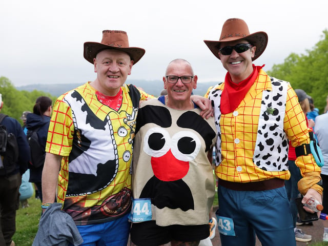 Martin Caldwell, Clive Nesbitt and Matthew Nicholson at the Phoenix Energy Belfast City Marathon leaving the grounds of the Stormont Estate.
