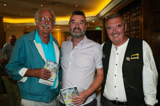 Author and tour guide Francis John Higgins (right) with shipyard mates Jim Forsythe and Liam Brown.