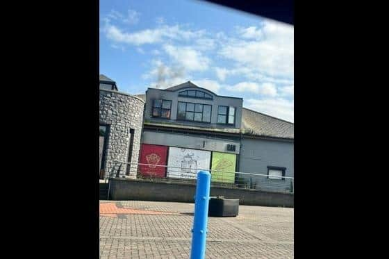 Flames spotted at the seafront complex yesterday.