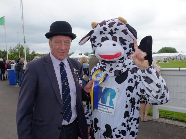 Bella the Kidney Cow from Northern Ireland Kidney Research Fund with Balmoral Show judge Charles Mark.