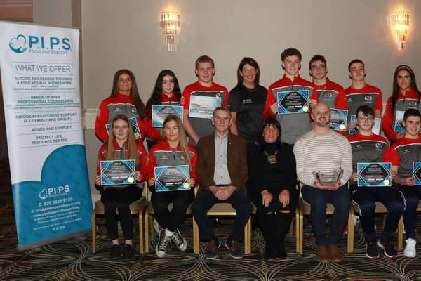 Chairperson Newry, Mourne and Down Council, Councillor Valerie Harte, Seamus McCabe CEO PIPS Hope and Support with the Red Hot Chilli  Dippers and Jacqueline McClelland and Steven Grimley.