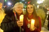 Eileen Murphy, left, CEO of Women's Aid Armagh/Down pictured with Lord Mayor of ABC Council, Councillor Sarah Duffy at the vigil on Tuesday evening. LM50-221.