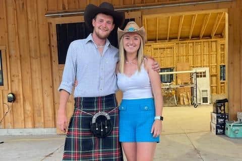 Lauren at the final barn party in Niagara wearing her new cowboy gear all the way from Alberta, with Ryan from Scotland.