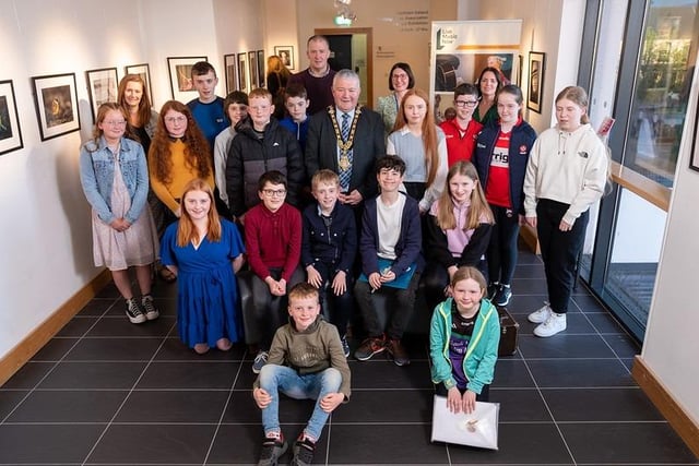 Young Musicians and organisers from Comhaltas Ceoltóirí Éireann - Emma Loughery and Brian McNicoll - with Mayor, Councillor Ivor Wallace, Alice Lewis National Director LMN NI and Shirleen McCann Bank of Ireland