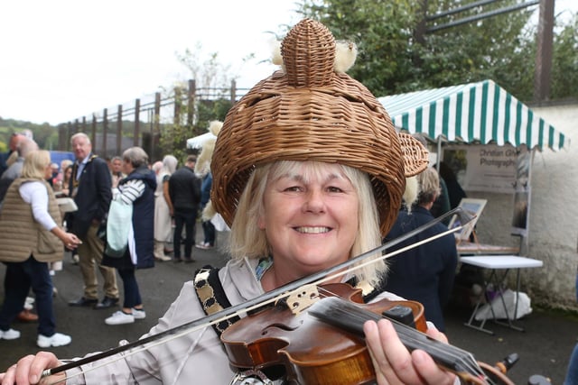 Deputy Mayor Margaret Anne McKillop joins the Armagh Rhymers for a tune