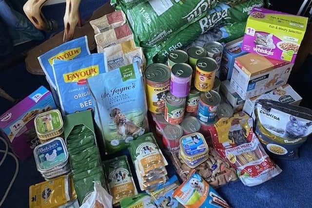 Portadown woman Donna Whitten has set up a Pet Food Bank to help those struggling to feed their dogs and cats. Here is just some of the food already donated.