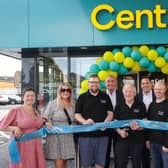 Celebrating the new Centra Scotch Street are (l-r) siblings Christine McNally, Amanda Woolsey, Gordon Woolsey, father Don Woolsey, James Woolsey, Pauline Woolsey and Julie-Ann Liggett. They are joined by Musgrave NI Managing Director Trevor Magill (back, centre left) and Retail Sales Director David Higgins (back, centre right).