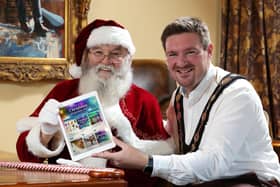 Santa stops by the Mayor's Parlour to help Councillor Scott Carson launch the council's Christmas programme