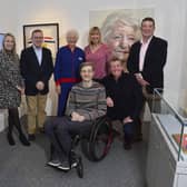 Lady Mary Peters and guests celebrating the launch of the new exhibition at the Lisburn Museum