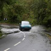 A Met Office yellow weather warning for heavy rain is in place across Northern Ireland. Some flooded roads and fallen trees have been reported with most parts to receive between 10 to 33mm of rain. Roads in south Belfast flood with the heavy rain. Picture By: Arthur Allison: Pacemaker.