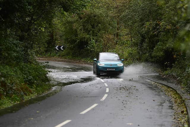 A Met Office yellow weather warning for heavy rain is in place across Northern Ireland. Some flooded roads and fallen trees have been reported with most parts to receive between 10 to 33mm of rain. Roads in south Belfast flood with the heavy rain. Picture By: Arthur Allison: Pacemaker.
