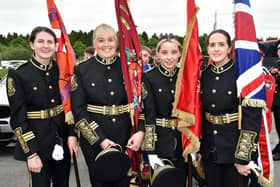 Standard bearers of Kilcluney Volunteers Flute Band, Markethill pictrued before the Mullabrack Accordion Band 40th anniversary parade on Friday, May 26. Included are from left, Zara Johnston, Rosir Carson, Samantha Milligan and Laura Livingstone. PT22-208. Picture: Tony Hendron