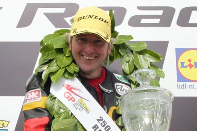 Davy Morgan celebrating in August  2012 at the Wash n Dash 250cc race at the Ulster Grand Priix. Picture:  Matt Mackey/ Press Eye