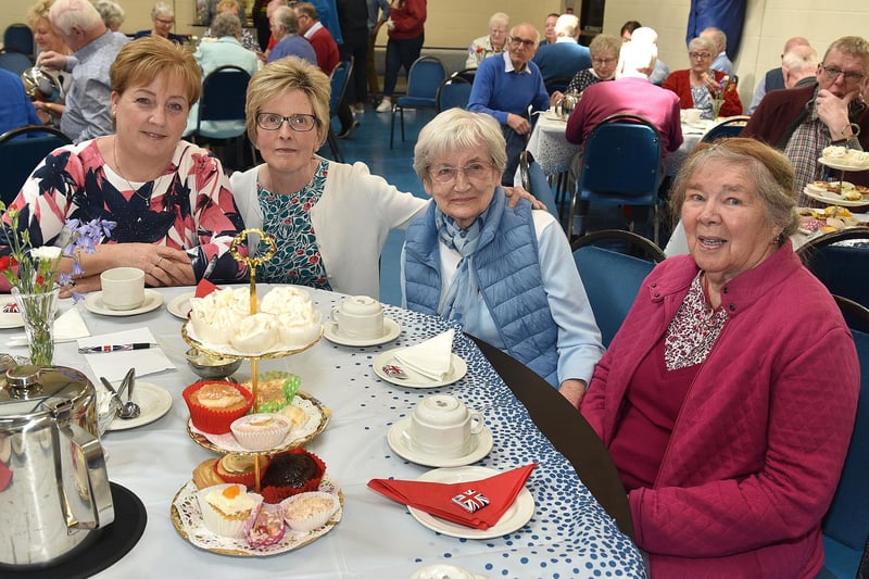 Smiling for our photographer are guests at the  Richhill Presbyterian Tuesday Morning Club Coronation Tea in  Richhill Presbyterian Church. PT17-273.