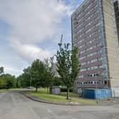NIHE has been questioned over the delayed demolition of Dunmurry tower blocks. Pic credit: Google