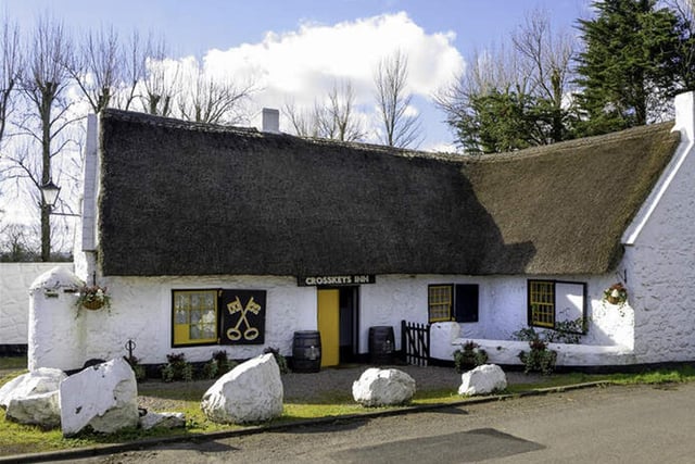 Located at Toomebridge, around 30 minutes from Belfast, the Crosskeys Inn in County Antrim is Ireland’s oldest thatched pub. 
The small venue, which dates back to around 1654, is well regarded by locals and visitors alike, even being crowned BBC Countryfile’s County Pub Of The Year in 2017. 
With regular traditional music, storytelling sessions, and summer BBQs, the Crosskeys Inn is the perfect place to unwind, have a pint and learn about the history of this traditional Irish pub.
For more information, go to crosskeys-inn.com