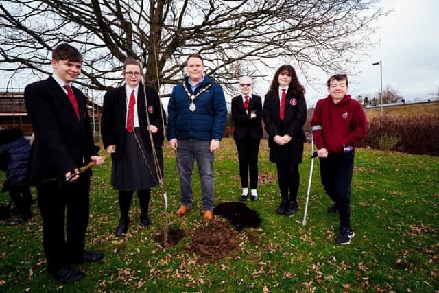 Jordanstown Special School is joined by The Mayor of Antrim and Newtownabbey, Cllr Cooper to plant a tree for the One Million Tree project. Picture: Antrim and Newtownabbey BC.