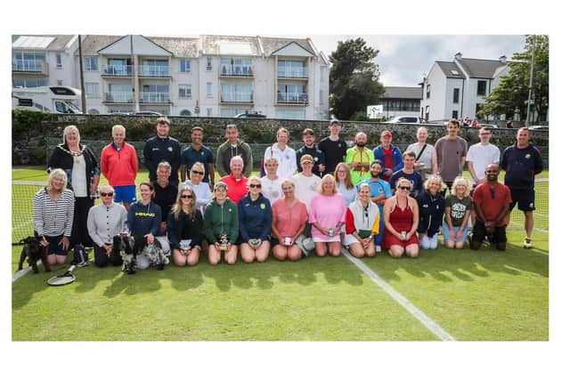 Deputy Mayor of Causeway Coast and Glens, Alderman Sandra Hunter, with referee Sean Moloney and winners of the Senior Tennis Tournament at the Alex McFarland Tennis Courts, Ballycastle. CREDIT CCGBC