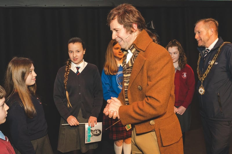 Rabbie Burns meets some of the schoolchildren with the Mayor of Antrim and Newtownabbey, Alderman Stephen Ross.
