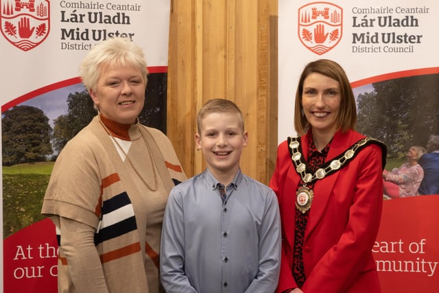 Pictured at the Civic Awards with Chair of the Council, Councillor Córa Corry, is Charlie Condy who was crowned the Northern Ireland Karting Champion for 2022. Also pictured is nominating councillor, Councillor Meta Graham.