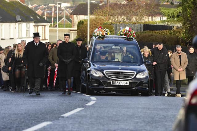 Pacemaker Press 10-12-2023: Funeral for Lurgan murder victim Odhran Kelly. 
Mr Kelly’s funeral Mass took place at St Peter’s Church in Lurgan on Sunday before burial at St Colman’s Cemetery. Mr Kelly’s body was found close to a burning vehicle in the Edward Street area of Lurgan in the early hours of Sunday morning. The 23-year-old nursing assistant said he died suddenly and was the beloved son of Jacqueline and the late Paul, and the much loved brother of Paul and the late Sinead.
Picture By: Arthur Allison: PacemakerPress.