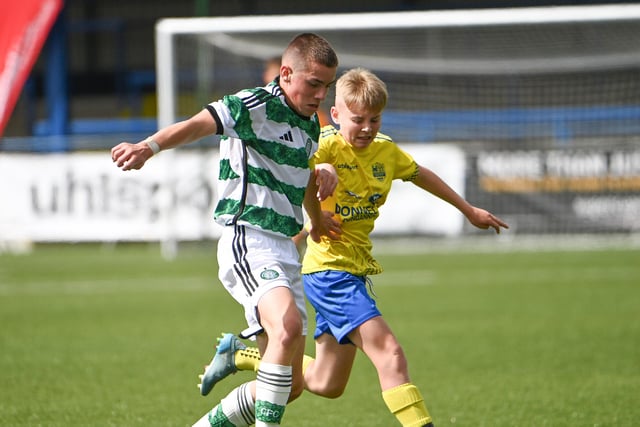 Celtic's Erskine Rennie in action with Dungannon's Lorcan Small.