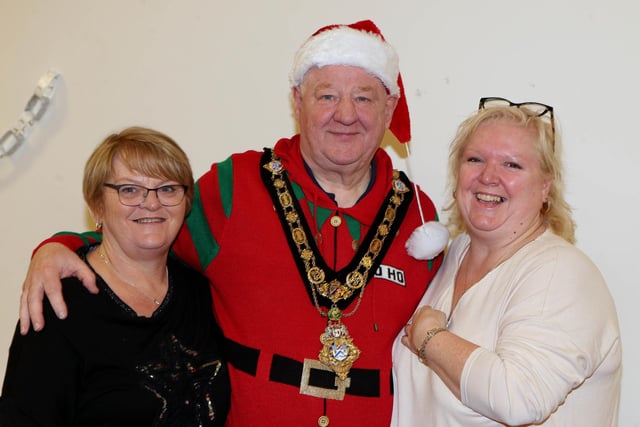 Julie Coll with Mayor  Steven Callaghan and Alison Stewart pictured at a fundraising Tea Party for his charity  RNLI,  held at Second Limavady Presbyterian Church on Saturday.