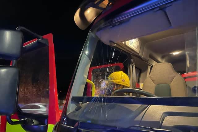 Two windows on a fire appliance were broken. (Pic NIFRS).