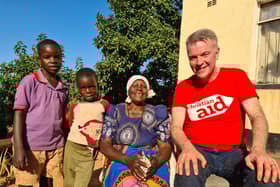 Anahilt man Ian Mullen with widowed grandmother Loveness Chapano and her grandsons at their new home