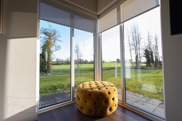 Enjoy views over the countryside from this light-filled home.