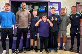 Head coach Dean Shiels, captain Lyndon Kane and defender Charles Dunne paid a visit to the school for a pre-Easter kick about on Tuesday, April 15.