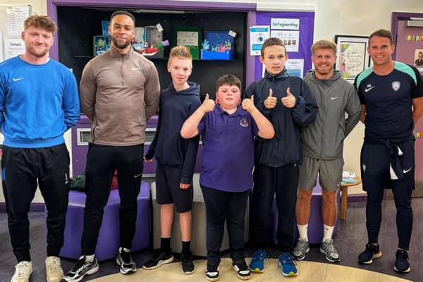 Head coach Dean Shiels, captain Lyndon Kane and defender Charles Dunne paid a visit to the school for a pre-Easter kick about on Tuesday, April 15.