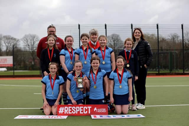 Winners of the Ulster Hockey’s Youth Division McCloy Cup, Waringstown Primary School, pictured with, from left: Marc Scott, Ulster Hockey CEO, Joan McCloy and Laura Jackson, Partner at BDO Northern Ireland, sponsors of the competition. Picture: The Front Row Union Sports.