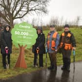 Centra Claudy staff visit volunteers at Faughan Valley CIC which received 300 trees