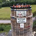 A bonfire in Moygashel, near Dungannon, with an effigy of a migrant boat on top of it.  The bonfire is due to be lit on Thursday 10th July around midnight | Jonathan Porter / Press Eye