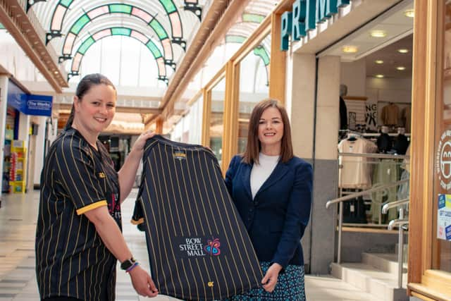 Lisburn Hawks captain Claire Loughran-Moore with Bow Street Mall centre manager, Karen Marshall.