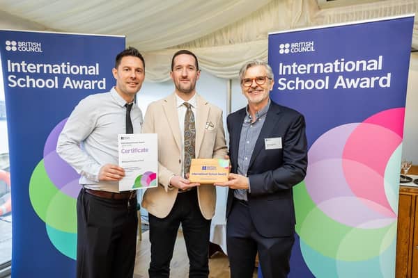 Pictured (L-R) Millburn Primary School International Language Coordinator, Ian Gilchrist with Vice-Principal Ruairi McClean and Mark Stephens CMG, Director, Cultural Engagement, British Council. CREDIT MILLBURN PS