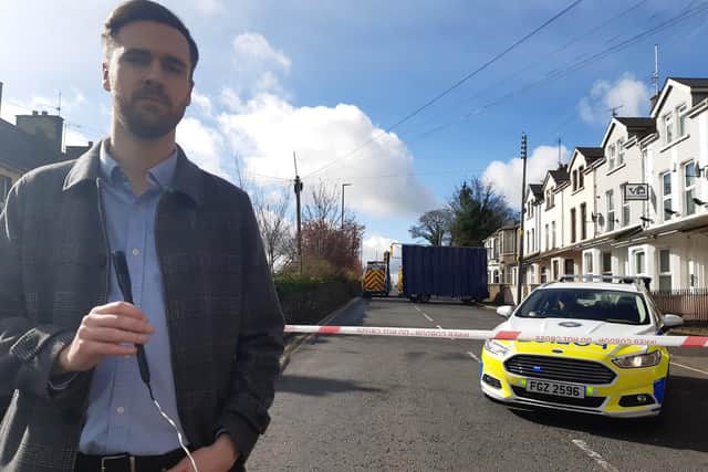 DUP Cllr Kyle Moutray at the scene of a fire in Church Street, Portadown, Co Armagh where a woman lost her life.