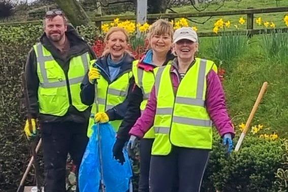 A light-hearted moment during the village tidy up.