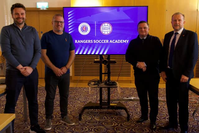 Ald Stephen Ross and Cllr Paul Dunlop with Nathan Hanley, Rangers Soccer Academies Manager (NI) and Gary Gibson, Head of Soccer Academies and International Relations at Rangers FC.