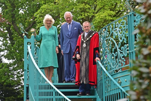King Charles and Queen Camilla with Mayor, Stpphen Ross, at the coronation garden. Picture: Colm Lenaghan/Pacemaker