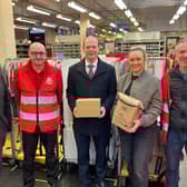 East Antrim MP Sammy Wilson, Gordon Lyons MLA and Cheryl Brownlee MLA with postal workers at Larne delivery office. Photo:submitted