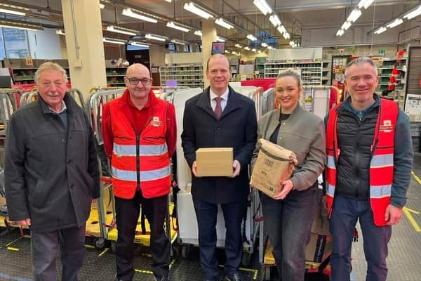East Antrim MP Sammy Wilson, Gordon Lyons MLA and Cheryl Brownlee MLA with postal workers at Larne delivery office. Photo:submitted