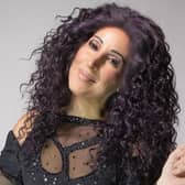 Trisha McCluney as Cher