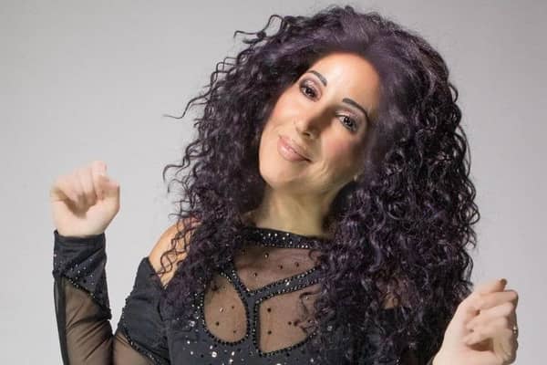 Trisha McCluney as Cher